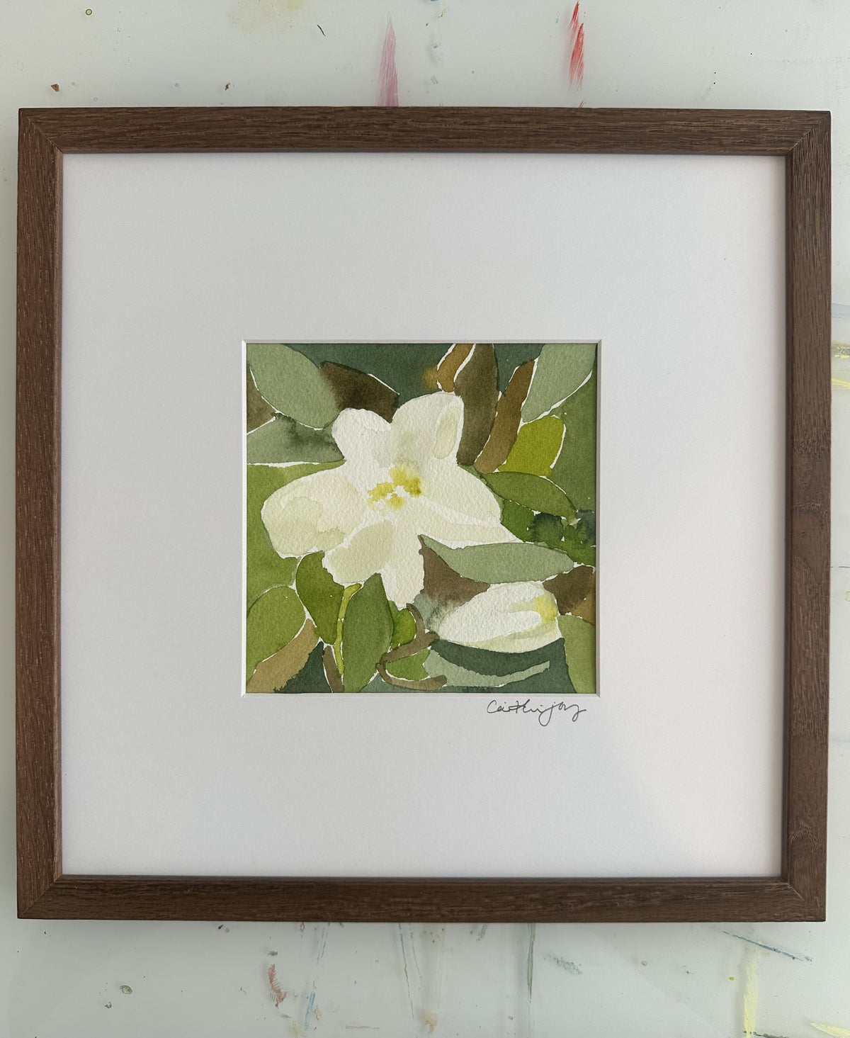 Magnolia No. 1 - framed original watercolour on the studio desk