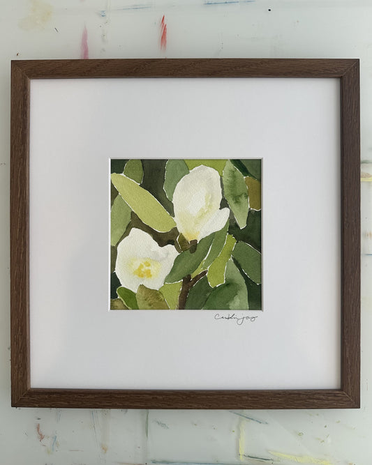 Magnolia No. 2 - framed original watercolour on the studio desk