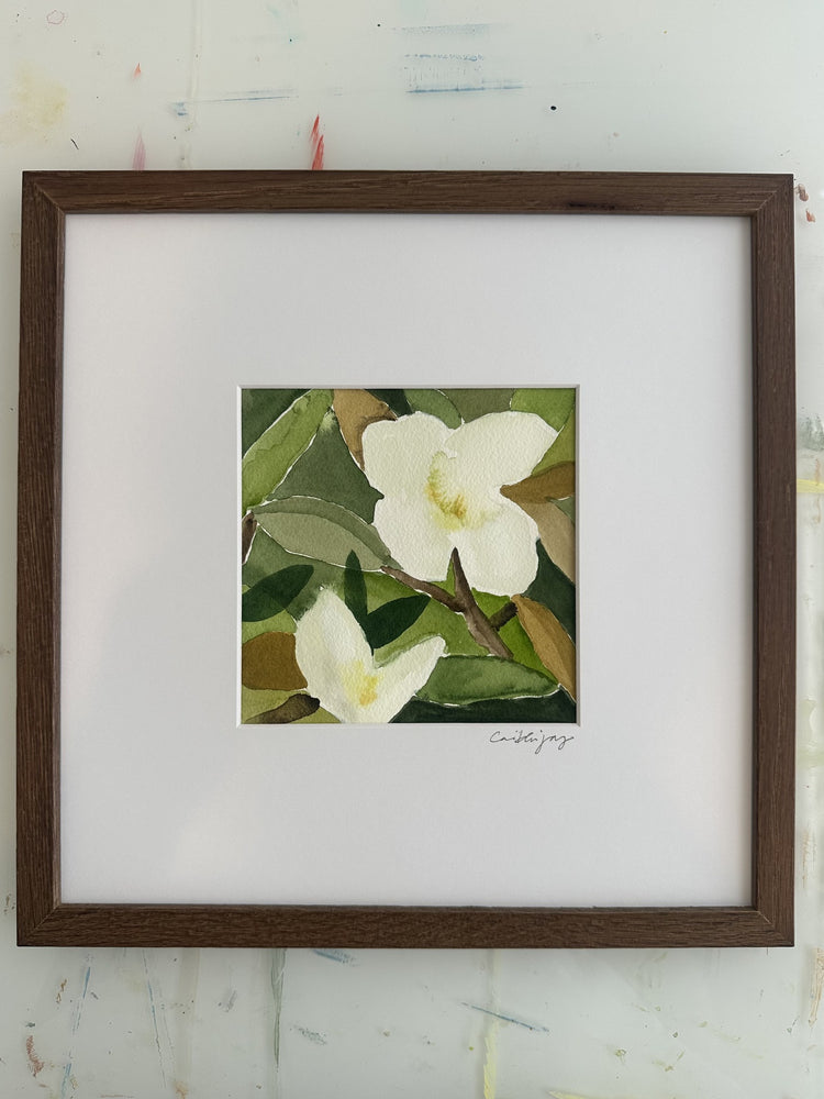 Magnolia No. 6 - framed original watercolour on the studio desk