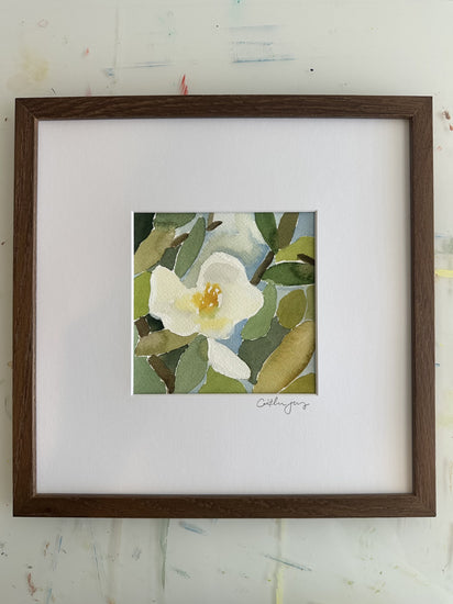 Magnolia No. 7 - framed original watercolour on the studio desk