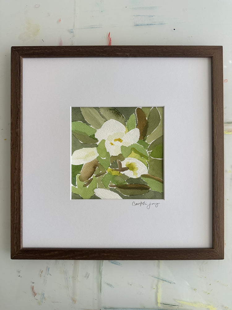 Magnolia No. 8 - framed original watercolour on the studio desk